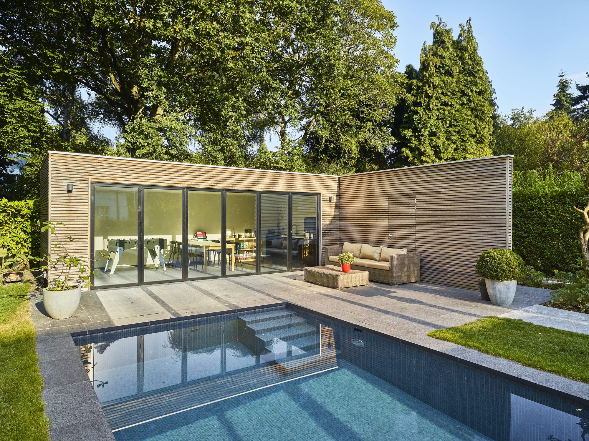 Houten poolhouse in padoek