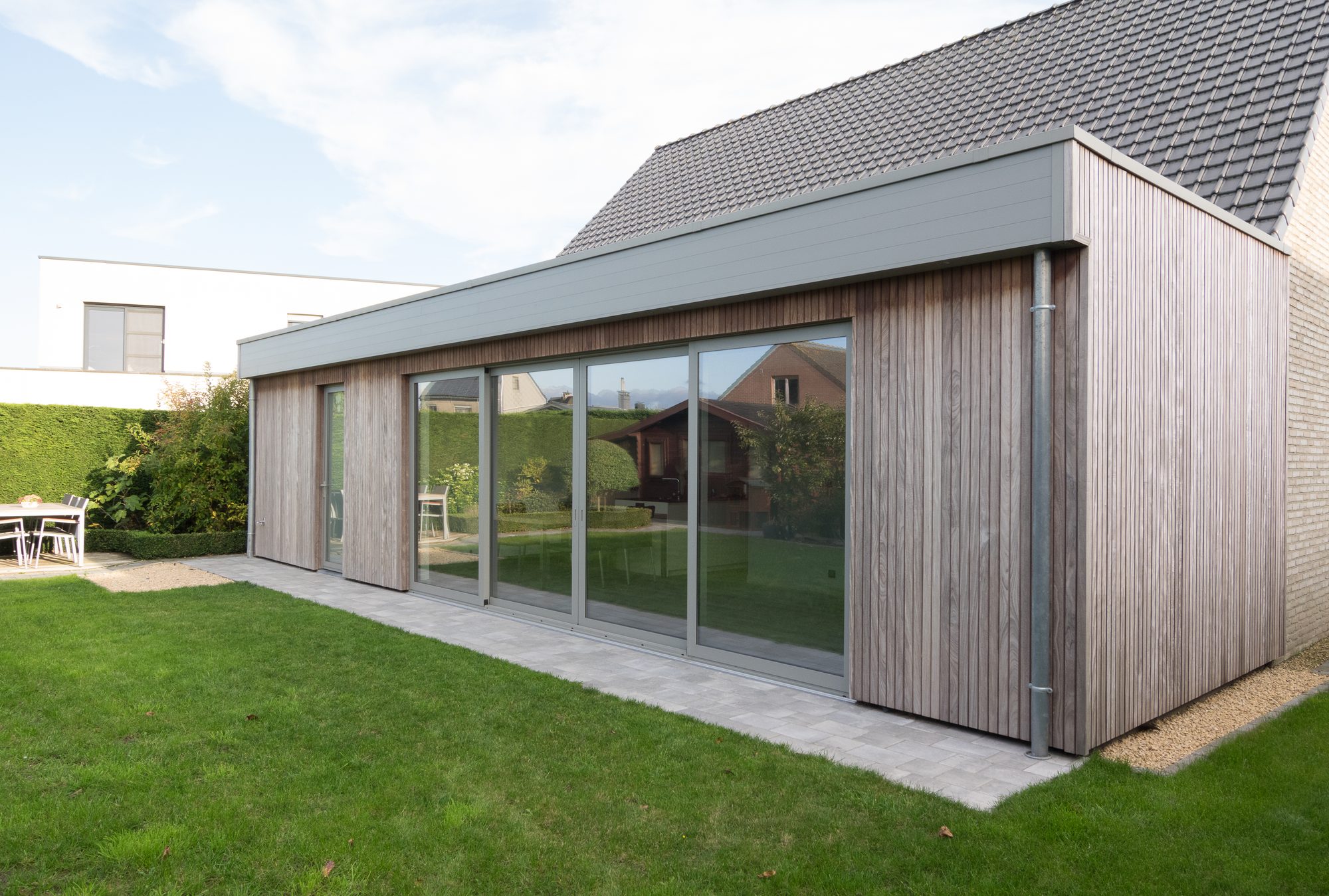 Extension de maison moderne avec bois et aluminium