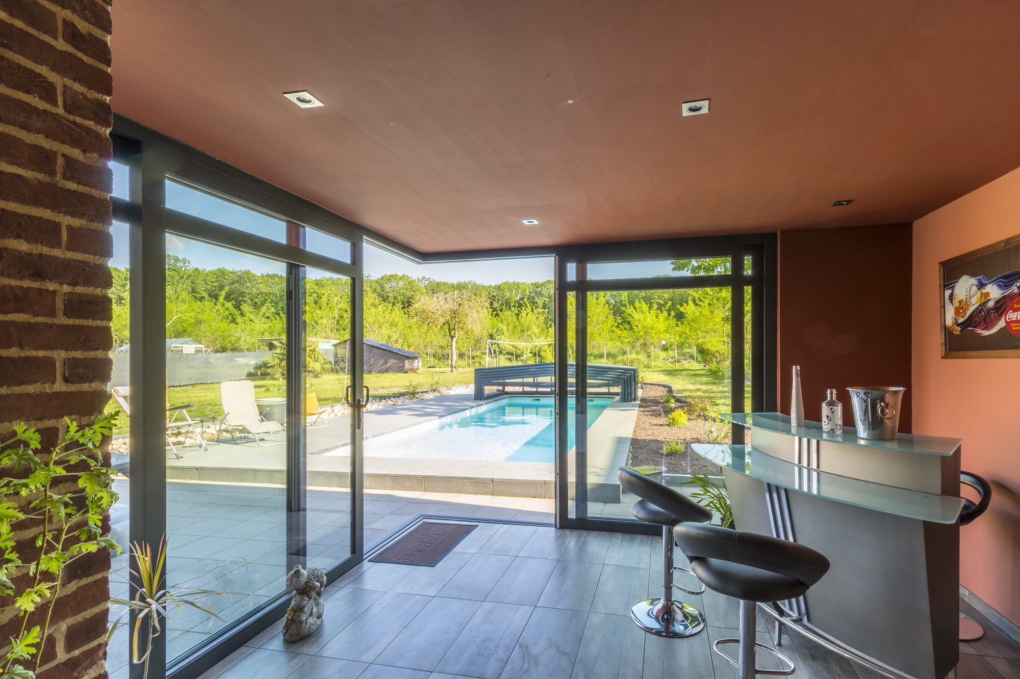 Intérieur Villa Véranda avec fenêtres coulissantes en alu