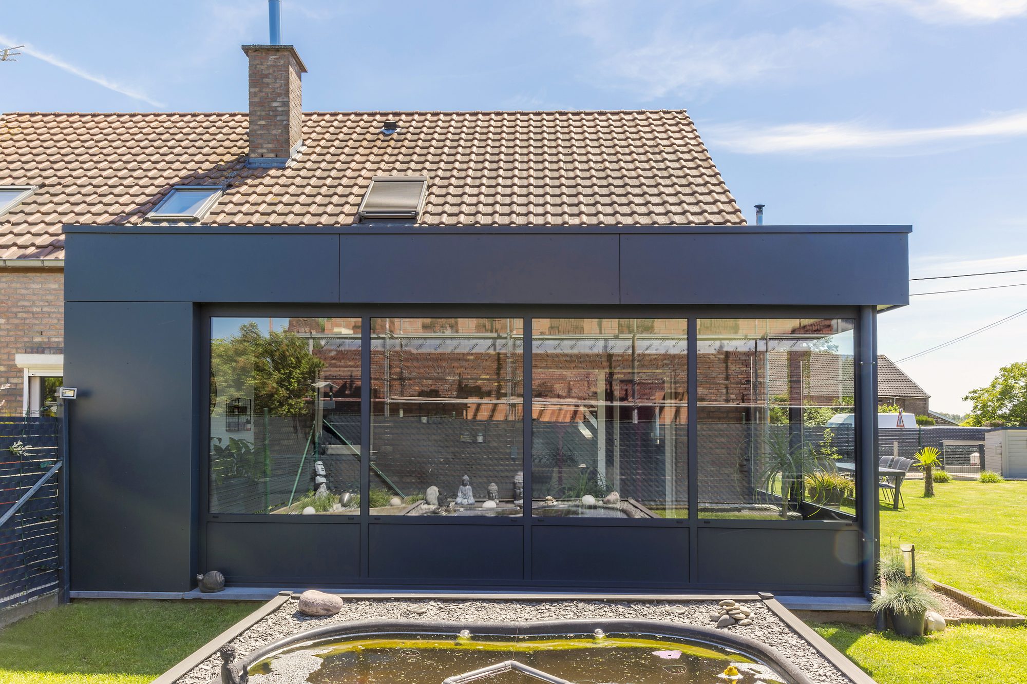 Moderne Woonuitbreiding met Aluminium en Trespa