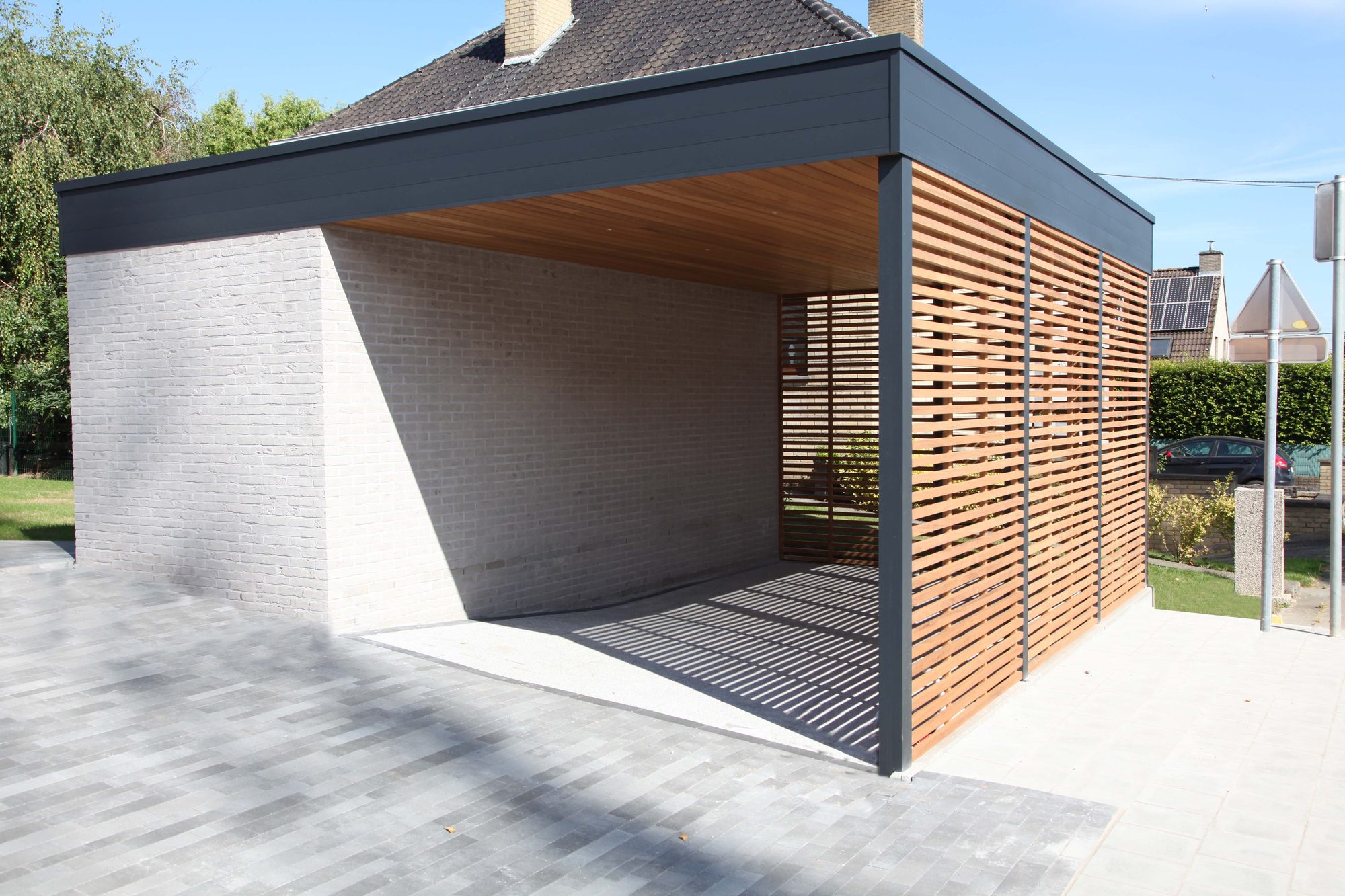 Carport avec Trespa et bois