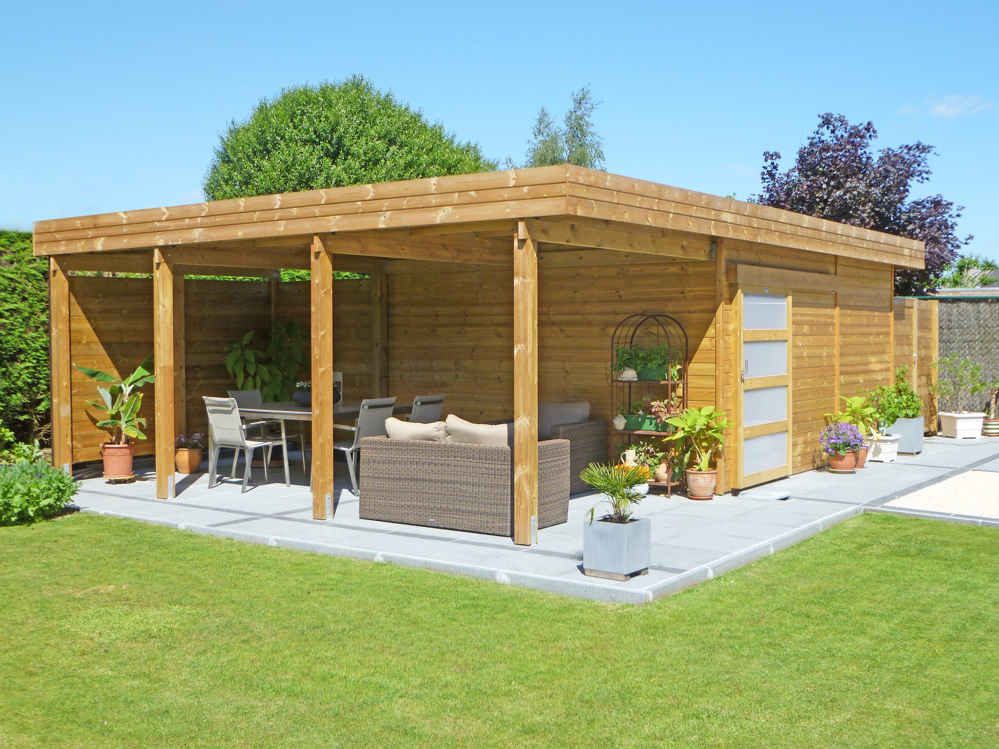 Abri de jardin moderne avec terrasse couverte