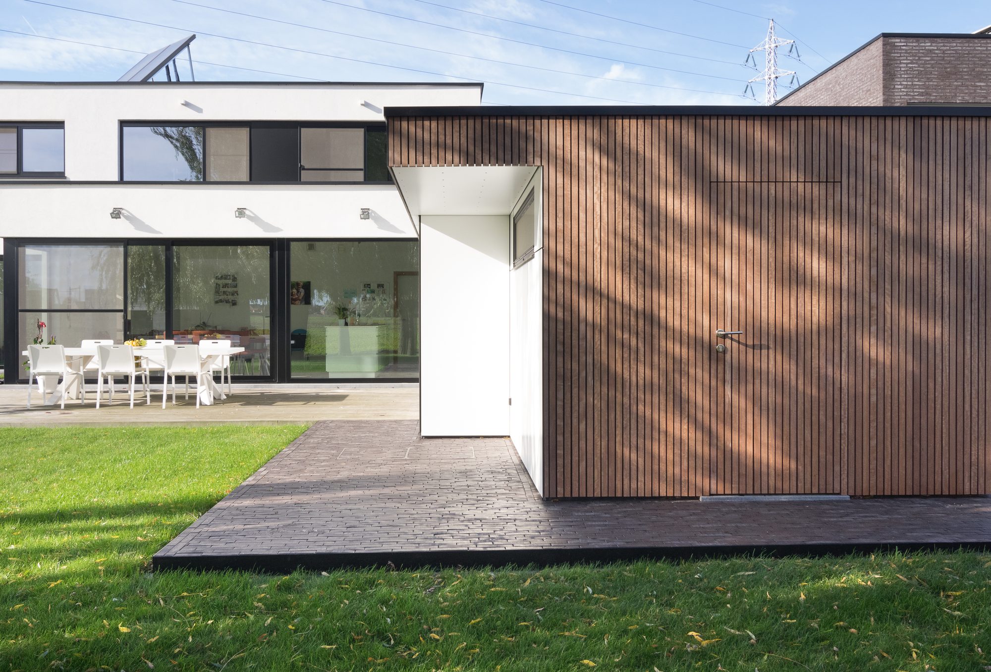 Tuinberging met Trespa en hout