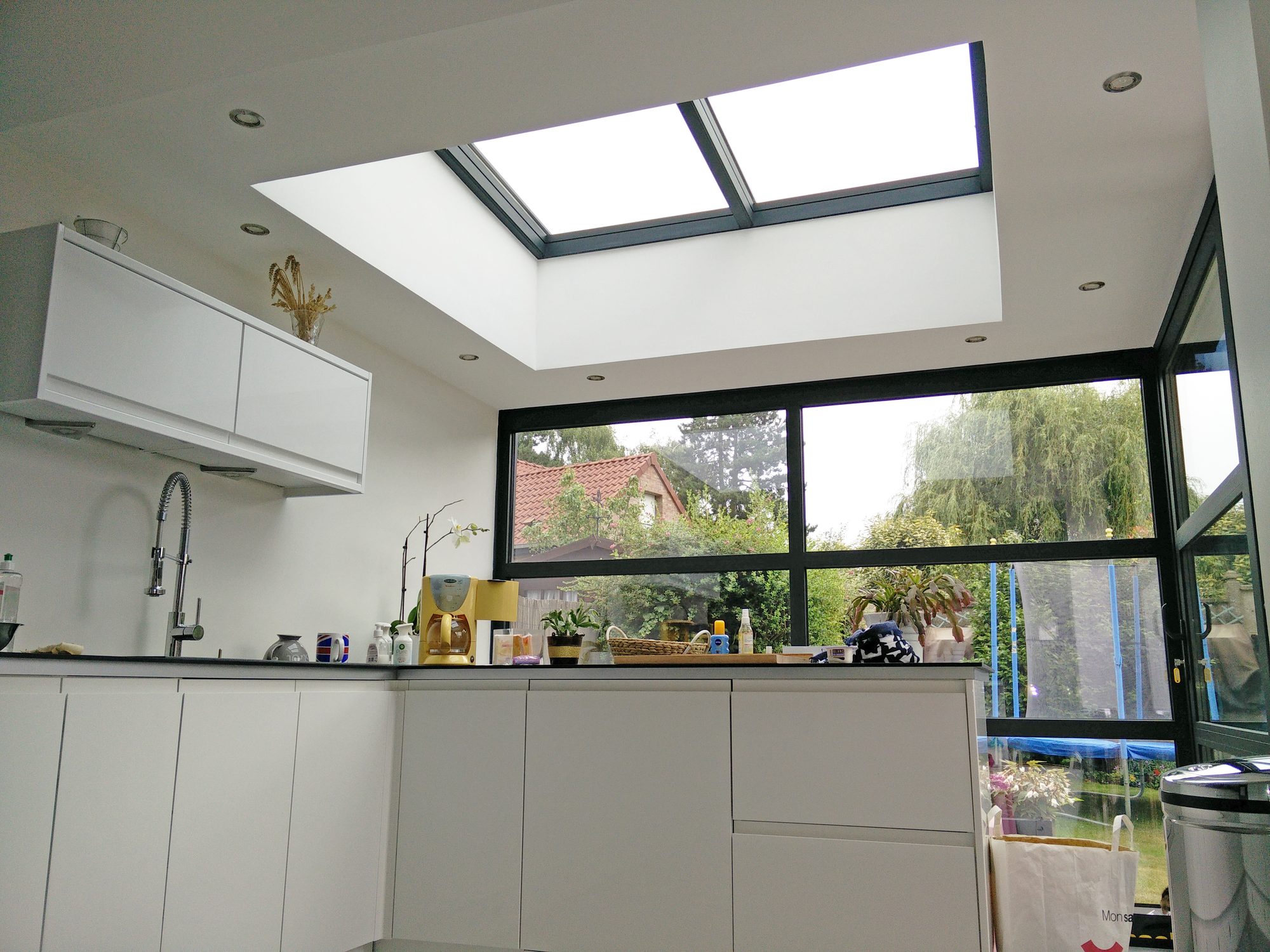 Extension de maison avec puits de lumière