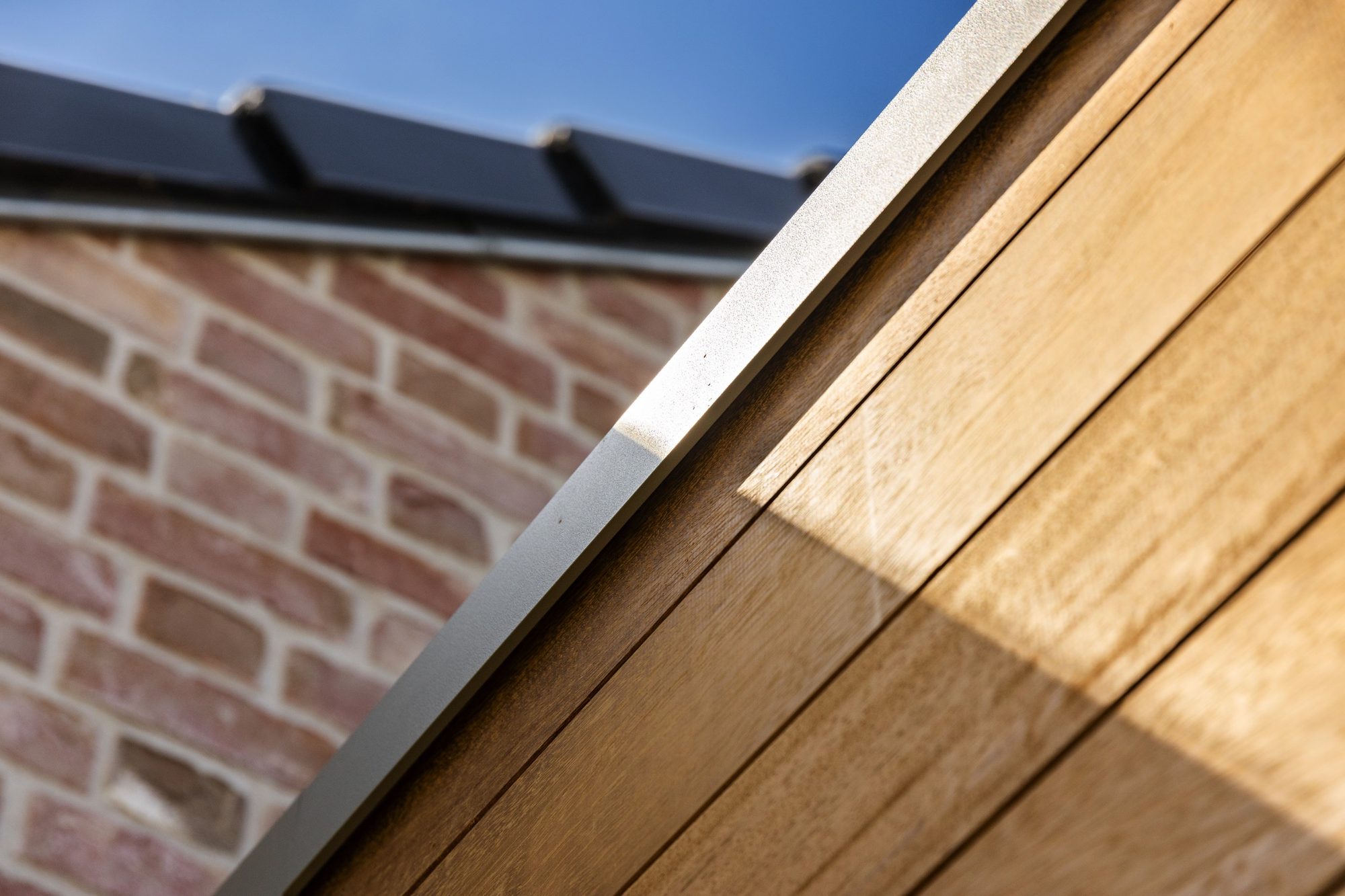 Profil de toit garage en bois
