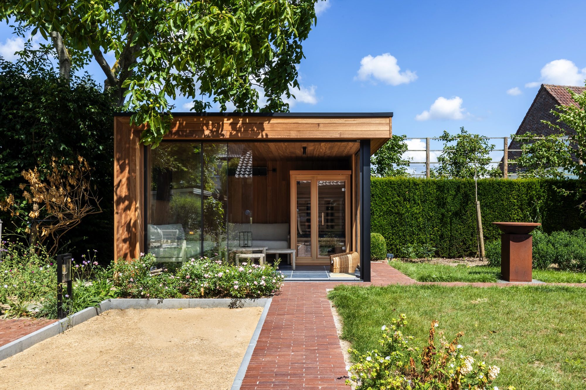 Tuinkamer met petanque baan