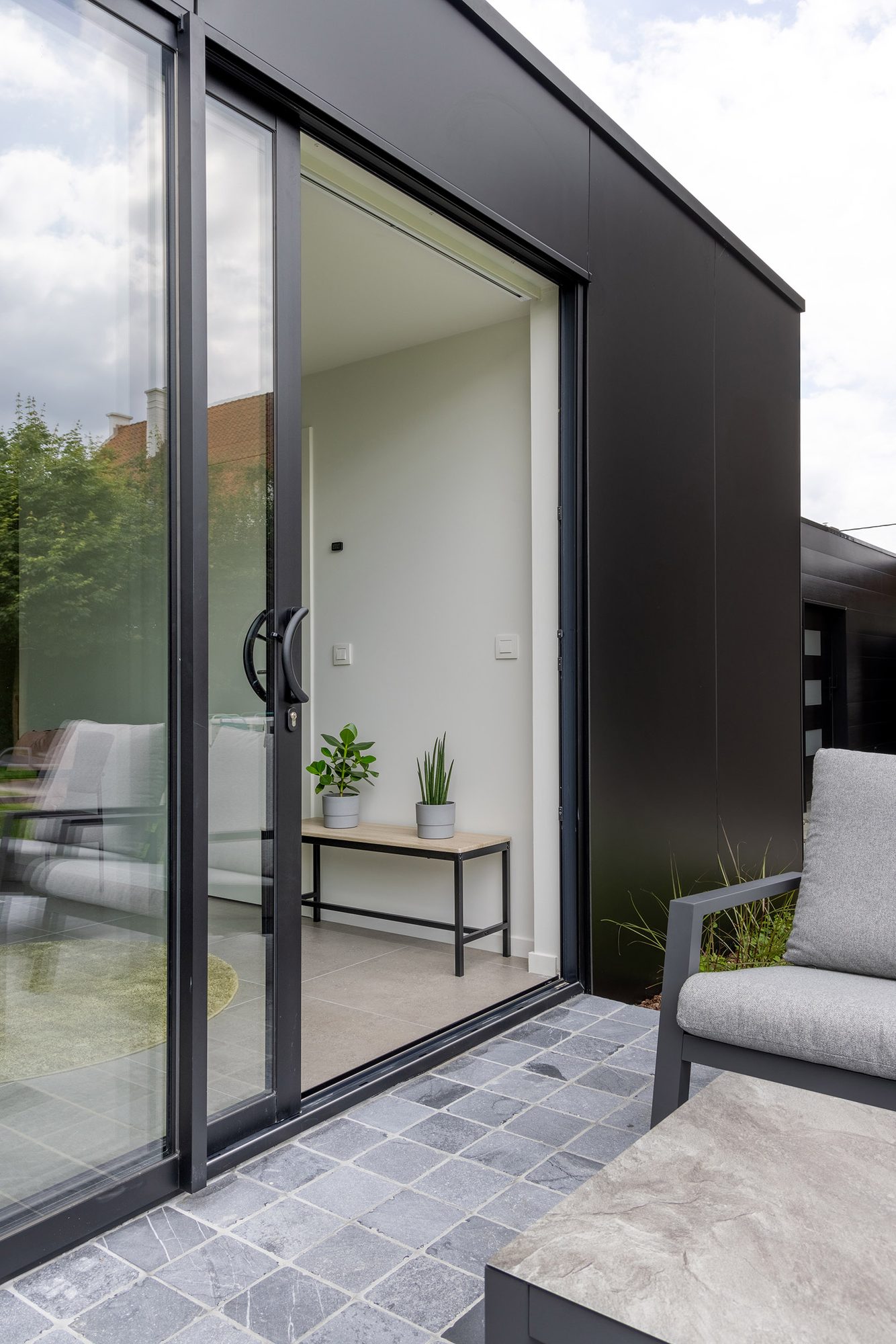 Tuinkamer met aluminium schuifraam