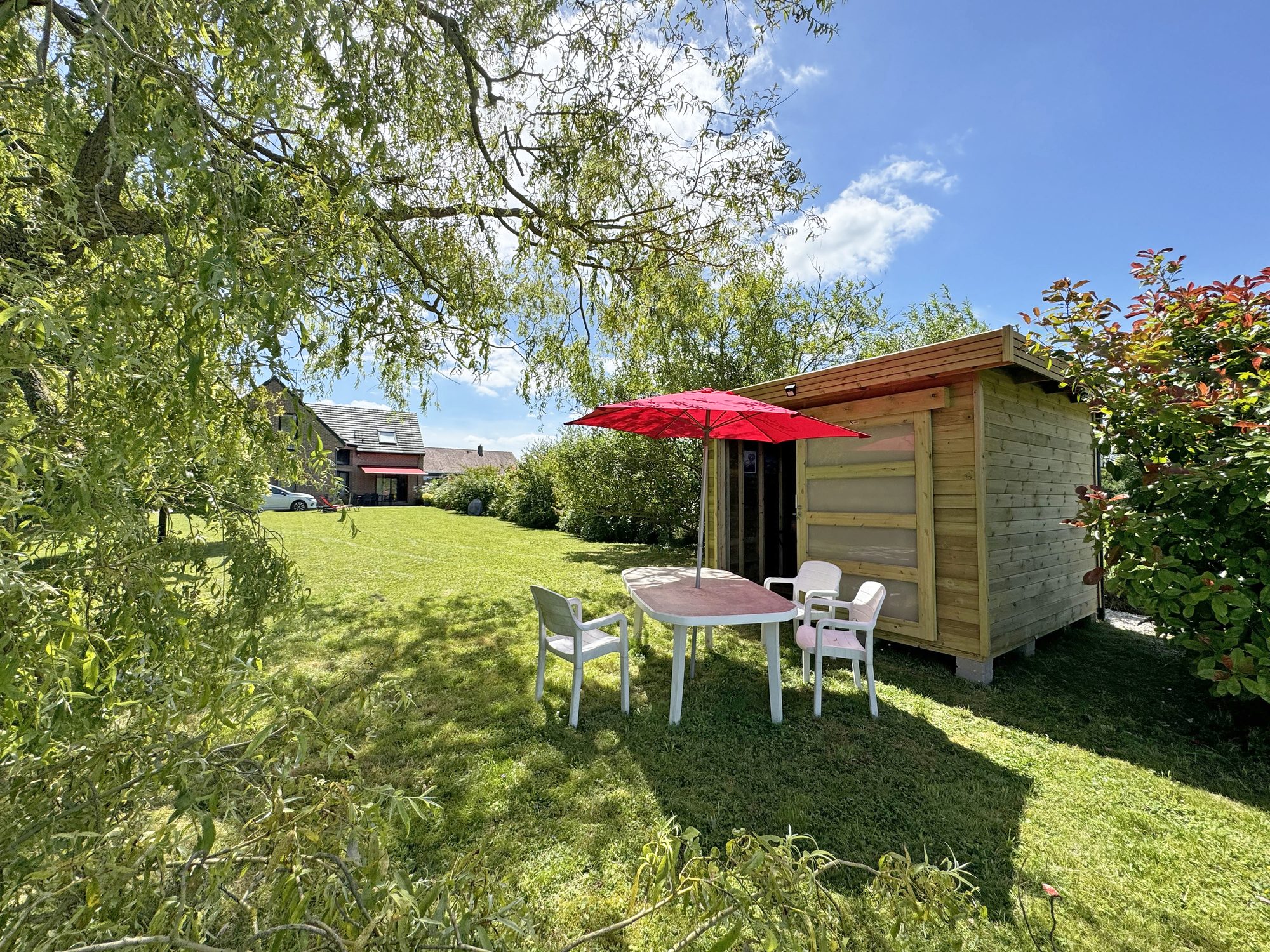 Abri de jardin en bois avec porte coulissante